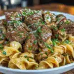 creamy beef stroganoff with egg noodles - featured image